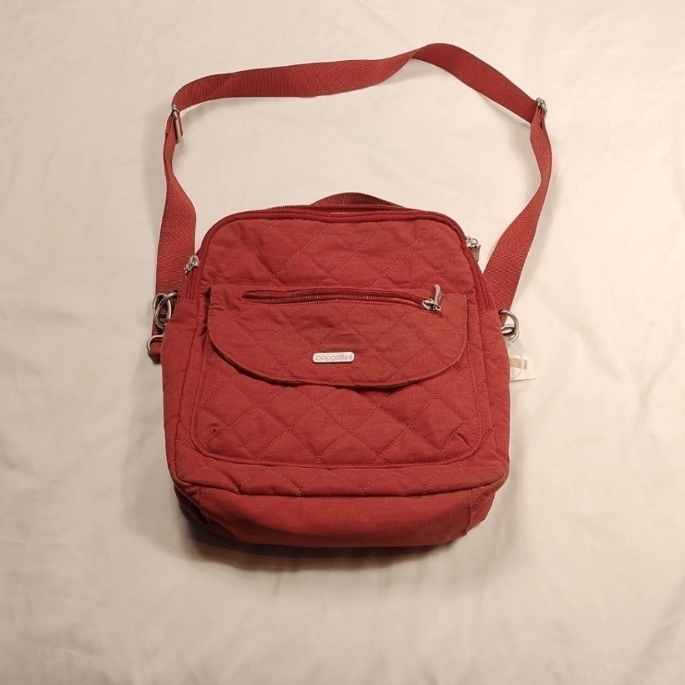 Baggalli crossbody purse, burnt orange in color